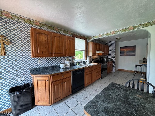 71322 Sharon Rd, Bridgeport, OH 43912 - kitchen featuring stainless steel range with electric cooktop, dishwasher, a textured ceiling, dark countertops, and light tile patterned flooring