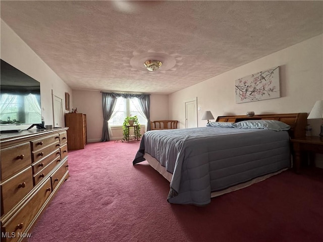 71322 Sharon Rd, Bridgeport, OH 43912 - bedroom with a textured ceiling and carpet flooring