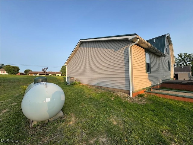 71322 Sharon Rd, Bridgeport, OH 43912 - view of home's exterior featuring a yard and cooling unit