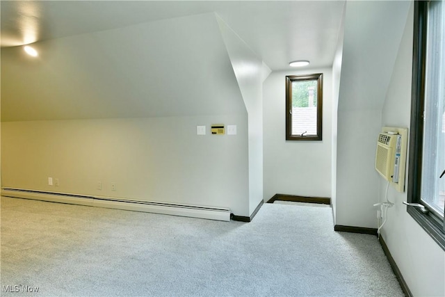 8848 King Graves Rd NE, Warren, OH 44484 - bonus room featuring carpet flooring, lofted ceiling, baseboards, a baseboard heating unit, and an AC wall unit