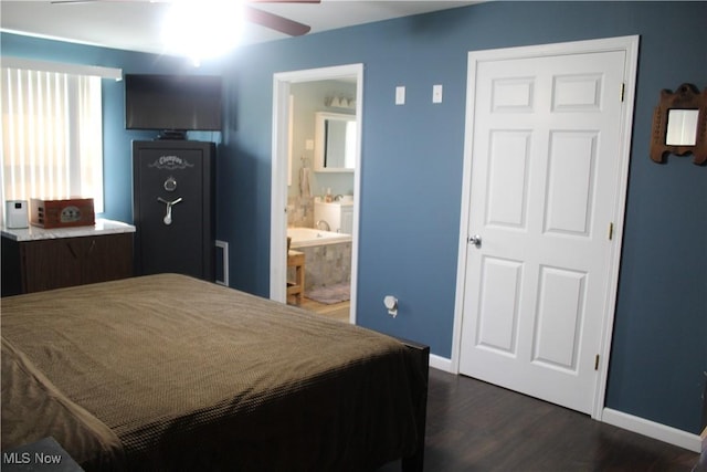 230 Rivercrest Dr, Coshocton, OH 43812 - bedroom with dark wood finished floors, baseboards, and connected bathroom