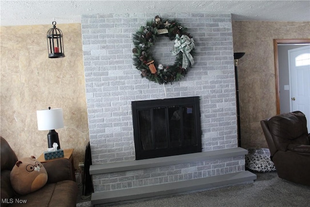 230 Rivercrest Dr, Coshocton, OH 43812 - living room featuring a textured ceiling and a fireplace