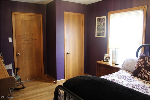 230 Rivercrest Dr, Coshocton, OH 43812 - bedroom with light wood-type flooring and baseboards