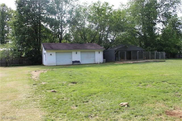 230 Rivercrest Dr, Coshocton, OH 43812 - view of yard with a garage and an outdoor structure