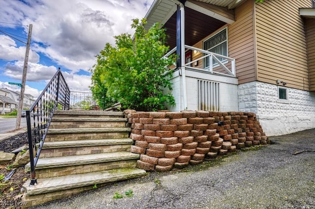 8208 Vista Ave, Garfield Heights, OH 44125 - view of side of property featuring stairway