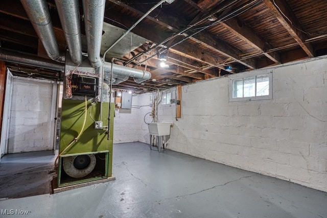 8208 Vista Ave, Garfield Heights, OH 44125 - basement featuring electric panel and a sink