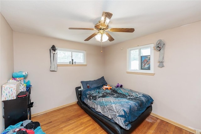 29431 Fairway Blvd, Willowick, OH 44095 - bedroom with wood finished floors and a ceiling fan