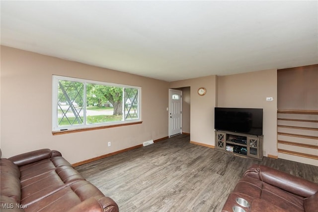 29431 Fairway Blvd, Willowick, OH 44095 - living room featuring wood finished floors and stairs