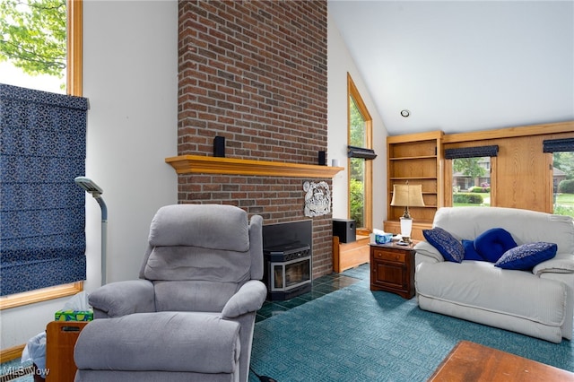 118 Steeplechase Ln, Munroe Falls, OH 44262 - living area featuring a wood stove, healthy amount of natural light, and lofted ceiling