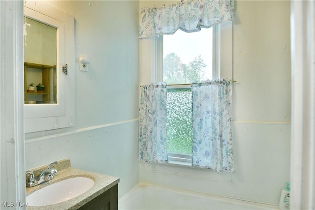 8273 Warren Meadville Rd, Kinsman, OH 44428 - full bathroom with plenty of natural light, vanity, and a bath