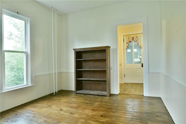 8273 Warren Meadville Rd, Kinsman, OH 44428 - empty room with plenty of natural light and hardwood / wood-style flooring