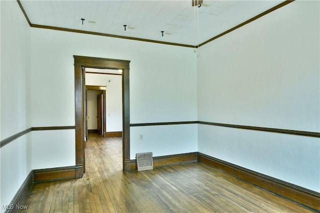 8273 Warren Meadville Rd, Kinsman, OH 44428 - spare room with hardwood / wood-style floors, baseboards, and ornamental molding