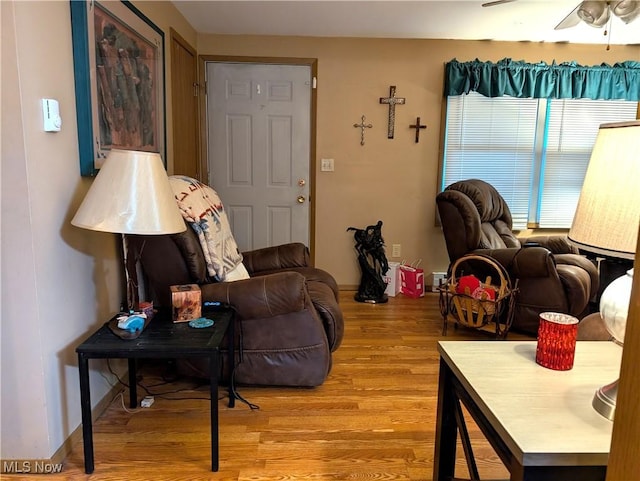 46340 Township Rd Unit 1208, Coshocton, OH 43812 - living area with light wood-style flooring, ceiling fan, and baseboards