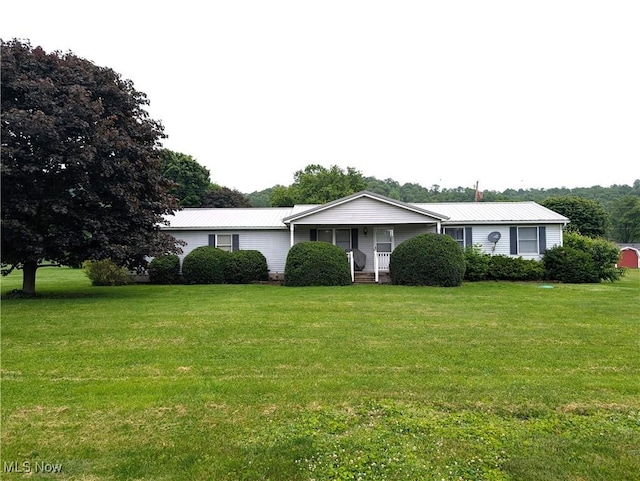 46340 Township Rd Unit 1208, Coshocton, OH 43812 - ranch-style house with a front yard, covered porch, and metal roof