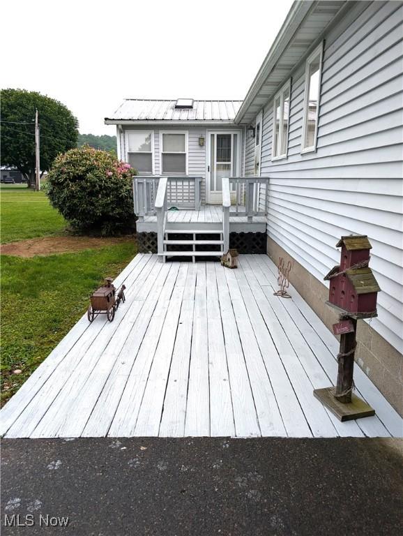 46340 Township Rd Unit 1208, Coshocton, OH 43812 - wooden deck with a lawn