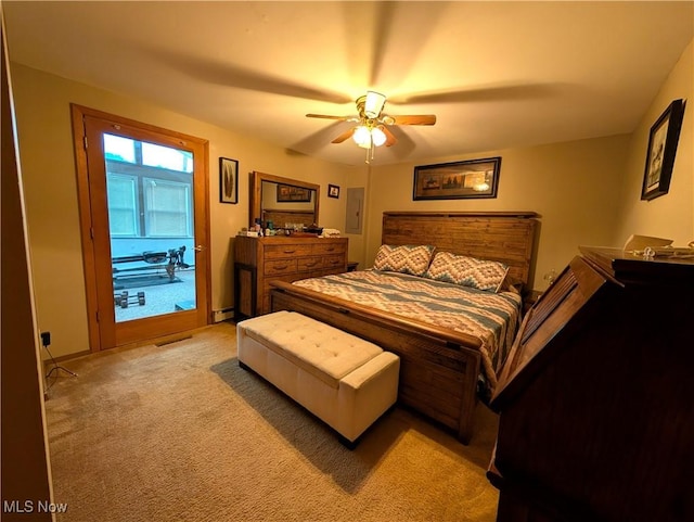 46340 Township Rd Unit 1208, Coshocton, OH 43812 - bedroom with light colored carpet, baseboard heating, and ceiling fan