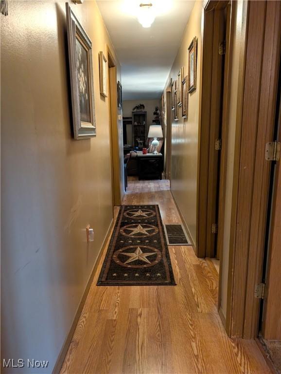46340 Township Rd Unit 1208, Coshocton, OH 43812 - corridor featuring wood finished floors