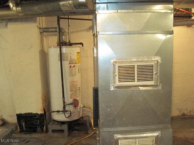 2710 W River Rd N, Elyria, OH 44035 - utility room featuring water heater