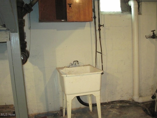 2710 W River Rd N, Elyria, OH 44035 - unfinished basement with a sink