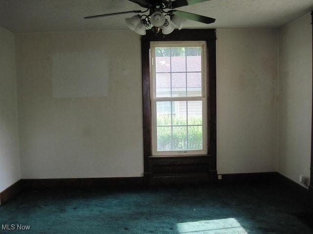 2710 W River Rd N, Elyria, OH 44035 - carpeted empty room featuring ceiling fan and baseboards