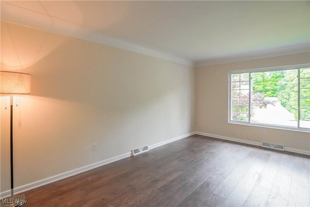 1105 E Blvd, Aurora, OH 44202 - unfurnished room with dark wood-type flooring and baseboards