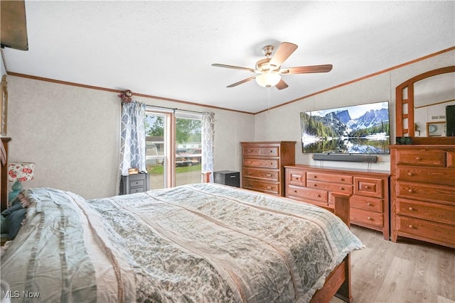 3764 US Highway 224 E Lot 92, Greenwich, OH 44837 - bedroom featuring crown molding, light wood-type flooring, vaulted ceiling, a ceiling fan, and a textured ceiling
