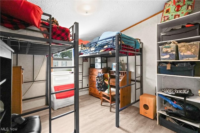 3764 US Highway 224 E Lot 92, Greenwich, OH 44837 - bedroom featuring wood finished floors and a textured ceiling