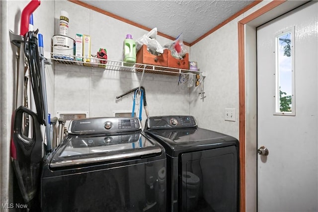 3764 US Highway 224 E Lot 92, Greenwich, OH 44837 - washroom featuring separate washer and dryer, ornamental molding, and a textured ceiling