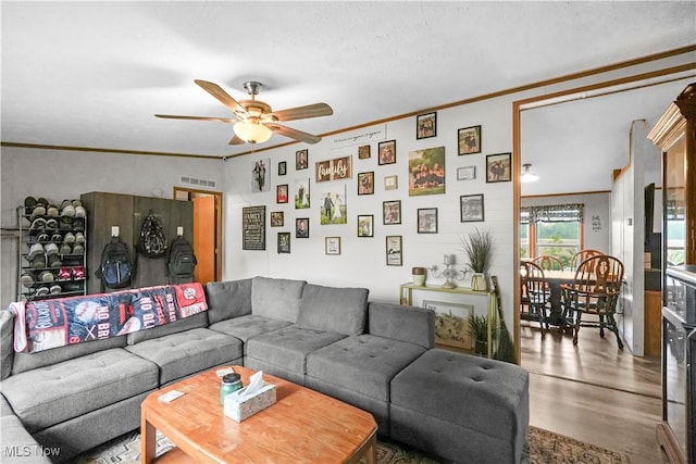 3764 US Highway 224 E Lot 92, Greenwich, OH 44837 - living area featuring crown molding, a ceiling fan, and wood finished floors