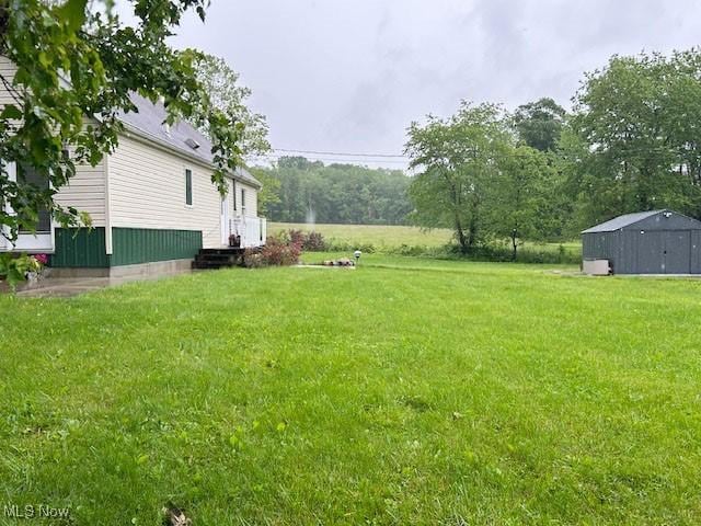 5910 Vore Ridge Rd, Athens, OH 45701 - view of grassy yard with an outdoor structure