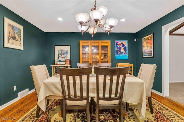 868 King George Blvd, South Euclid, OH 44121 - dining area featuring a chandelier, wood finished floors, baseboards, and recessed lighting