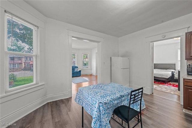 832 Wellman Ave SE, Massillon, OH 44646 - dining space featuring wood finished floors and baseboards