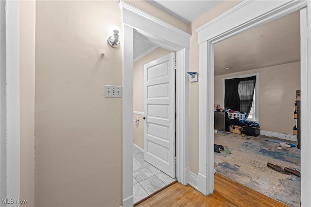 832 Wellman Ave SE, Massillon, OH 44646 - hallway featuring baseboards and wood finished floors