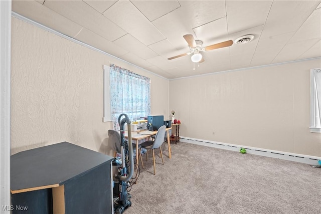 832 Wellman Ave SE, Massillon, OH 44646 - home office featuring baseboard heating, carpet, ceiling fan, and ornamental molding