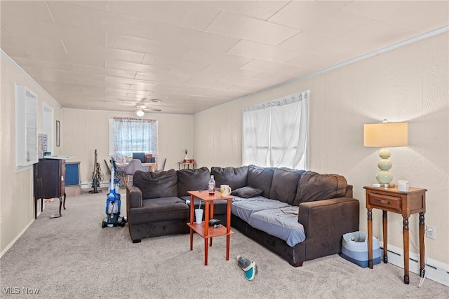 832 Wellman Ave SE, Massillon, OH 44646 - living area featuring carpet floors, ceiling fan, baseboards, and ornamental molding