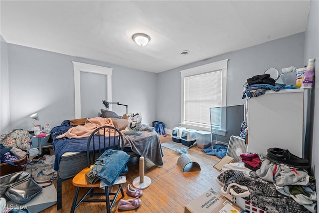 832 Wellman Ave SE, Massillon, OH 44646 - bedroom featuring wood finished floors and baseboards