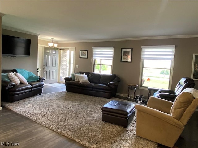 14035 Dover Rd, Apple Creek, OH 44606 - living area with dark wood finished floors, ornamental molding, and a chandelier