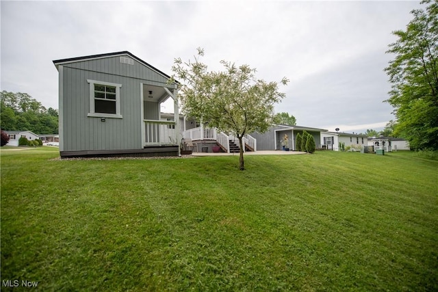 5725 Joleda Dr SW, Canton, OH 44706 - back of property featuring a lawn