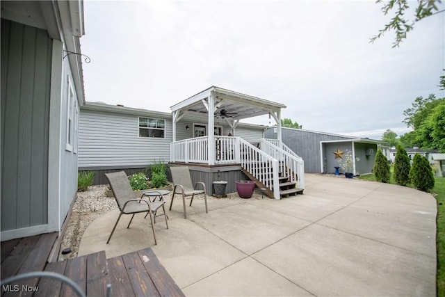 5725 Joleda Dr SW, Canton, OH 44706 - rear view of property featuring a patio area and a ceiling fan