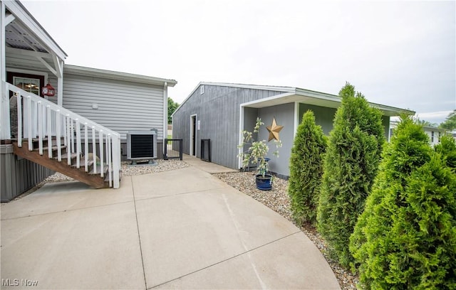5725 Joleda Dr SW, Canton, OH 44706 - view of property exterior featuring central AC unit