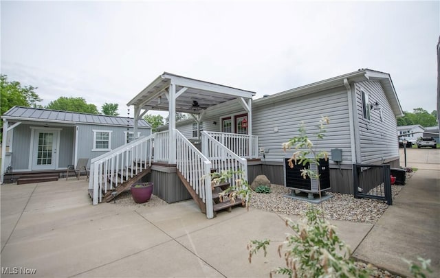 5725 Joleda Dr SW, Canton, OH 44706 - rear view of property with a porch and a patio area