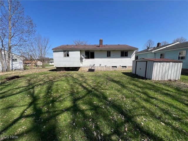 982 Hadcock Rd, Brunswick, OH 44212 - back of house with a lawn, a chimney, and central air condition unit