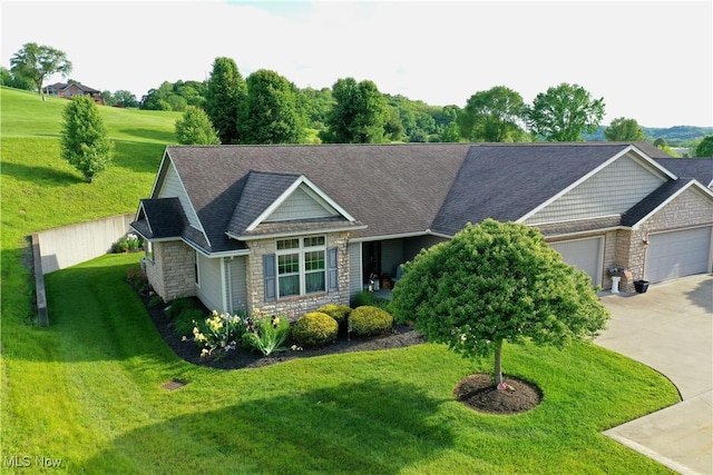 617 Wedgewood Way Unit 617, Millersburg, OH 44654 - craftsman house with stone siding, a garage, concrete driveway, and a front yard