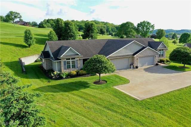 617 Wedgewood Way Unit 617, Millersburg, OH 44654 - view of front facade with an attached garage, stone siding, concrete driveway, and a front lawn