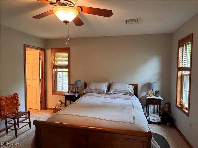 617 Wedgewood Way Unit 617, Millersburg, OH 44654 - bedroom featuring light colored carpet, multiple windows, and baseboards