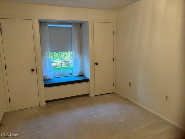 1931 King James Unit 131, Westlake, OH 44145 - unfurnished bedroom with light carpet and baseboards