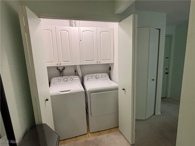 1931 King James Unit 131, Westlake, OH 44145 - washroom featuring cabinet space and washer and dryer