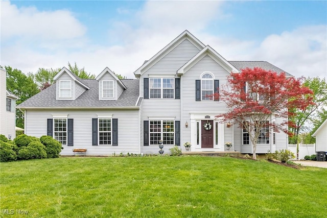 2768 Rising Meadow Dr, Akron, OH 44333 - colonial home with a front yard and a shingled roof