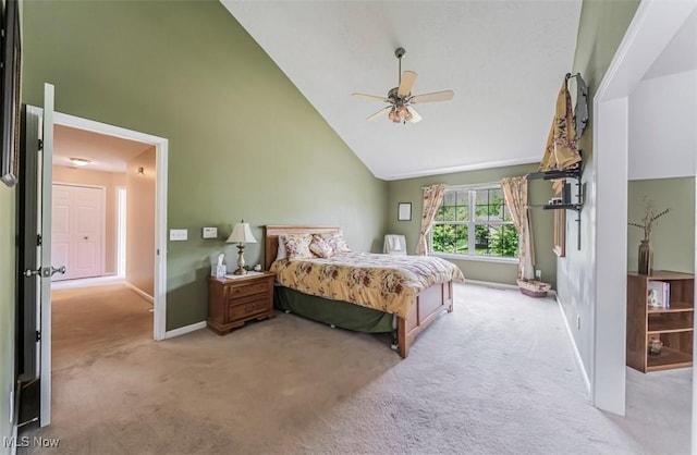 2768 Rising Meadow Dr, Akron, OH 44333 - bedroom with light carpet, baseboards, high vaulted ceiling, and ceiling fan