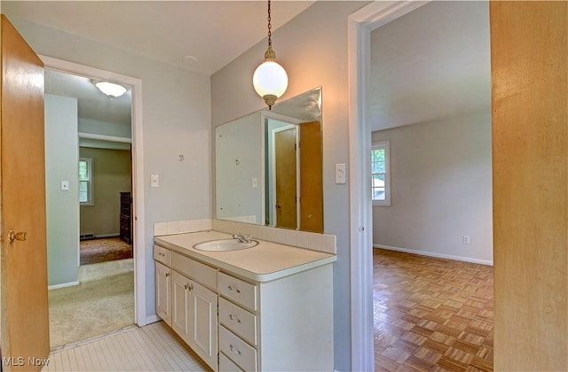 29590 Broxbourne Rd, North Olmsted, OH 44070 - bathroom featuring plenty of natural light, vanity, and baseboards